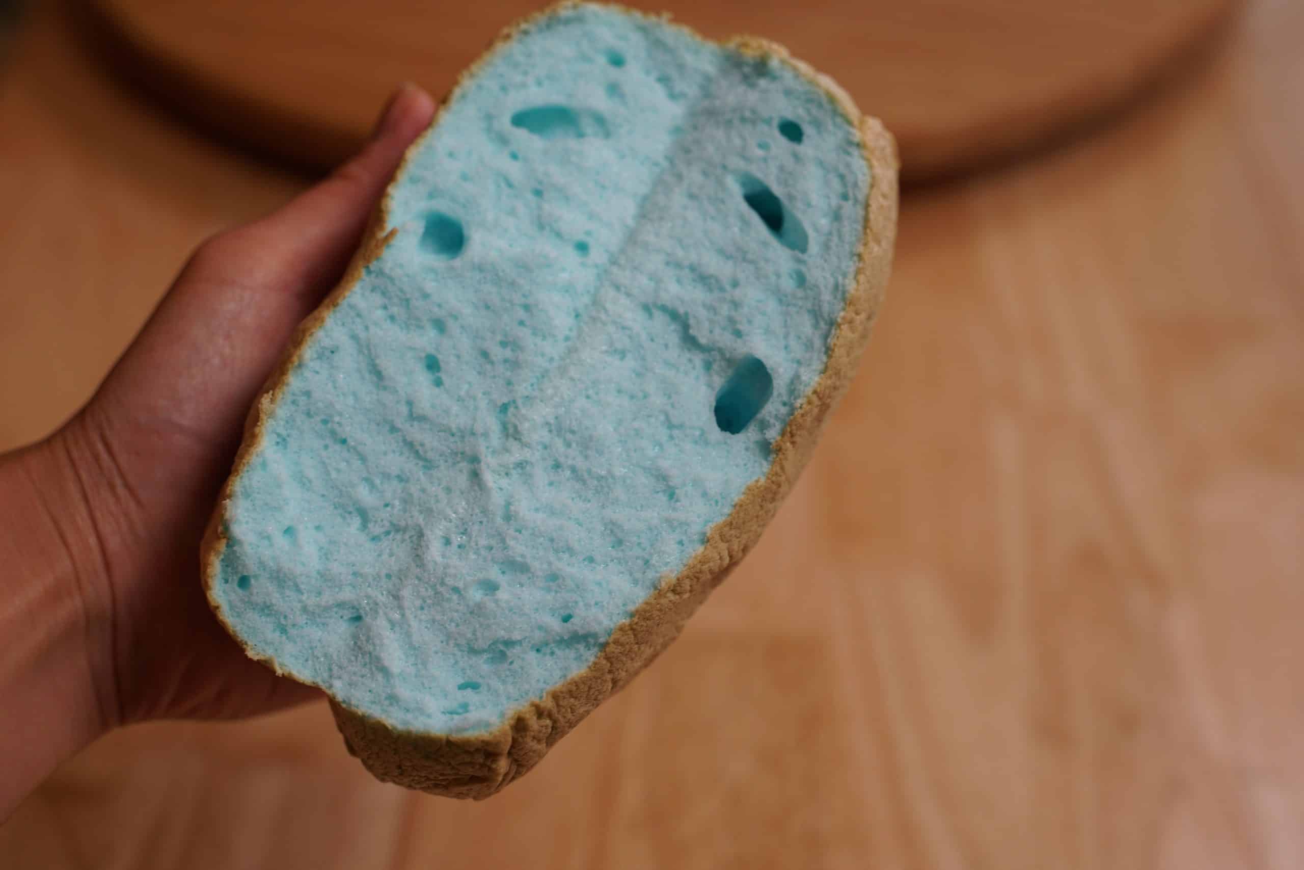Fluffy light interior of blue cloud bread.