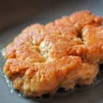 Wheat gluten frying in a pan.