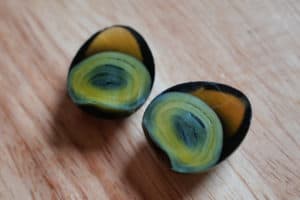 A century egg cut in half.