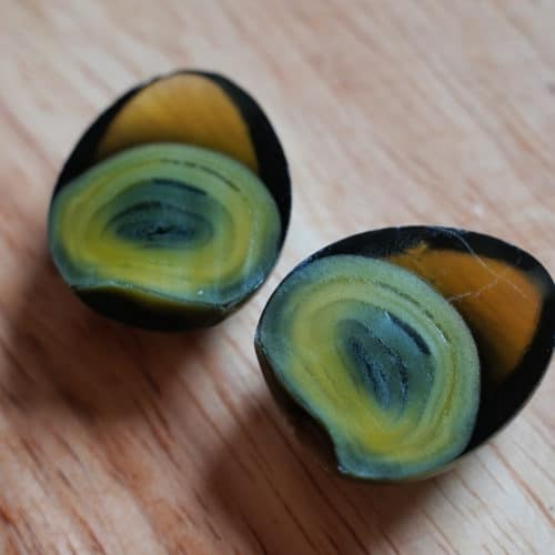 A century egg cut in half.