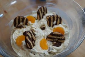 Keebler Fudge Stripes cookies and canned Mandarin orange slices in a Cool Whip/vanilla pudding salad base.