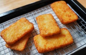 Homemade hash browns on rack.