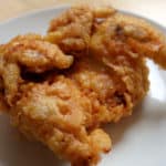 A deep fried whole Korean market style fried chicken.