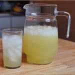 Pitcher of lemonade with a glass