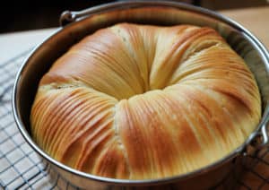 Wool roll bread in a pan.