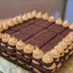 No-bake chocolate cake with layers of chocolate biscuits and cream cheese/dulce de leche.
