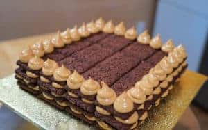 No-bake chocolate cake with layers of chocolate biscuits and cream cheese/dulce de leche.