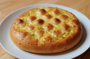 A golden brown pull a part Korean garlic cheese bread.