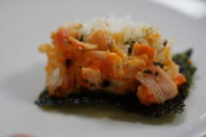 Sushi bake bite on a sheet of nori.